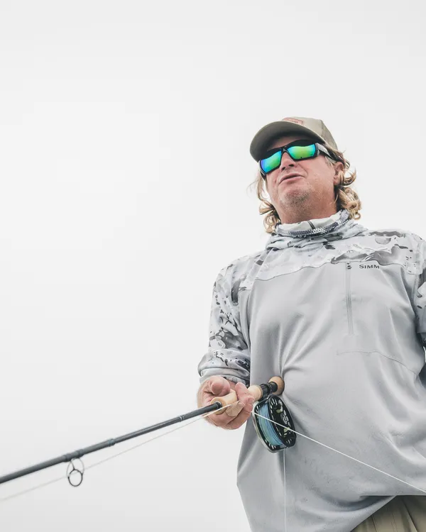 Jaime coaching an angler on proper strip cadence and presentation of a crab fly on the flat